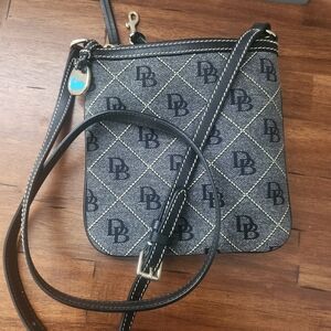 Dooney & Bourke Signature Crossbody Bag. Adjustable leather strap